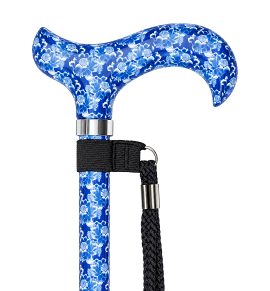 Canne bleue à fleurs avec poignée Derby et dragonne sur fond transparent
